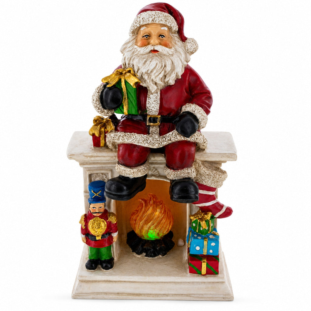Santa Sitting on a Fireplace LED Lights Figurine 7.75 Inches