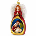 Guardian Angel over Nativity Glass Christmas Ornament
