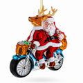 Santa and Reindeer Riding a Tandem Bike Glass Christmas Ornament