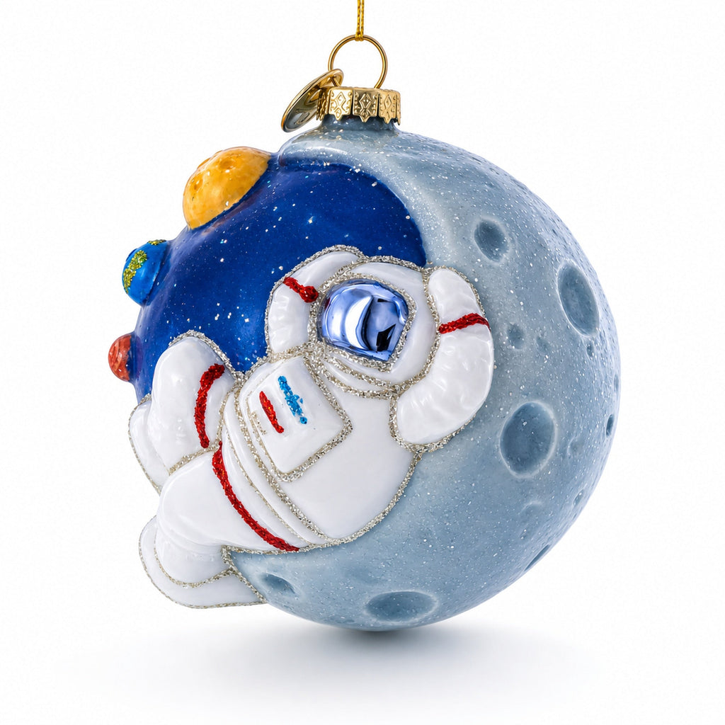Astronaut Floating in Outer Space Glass Christmas Ornament
