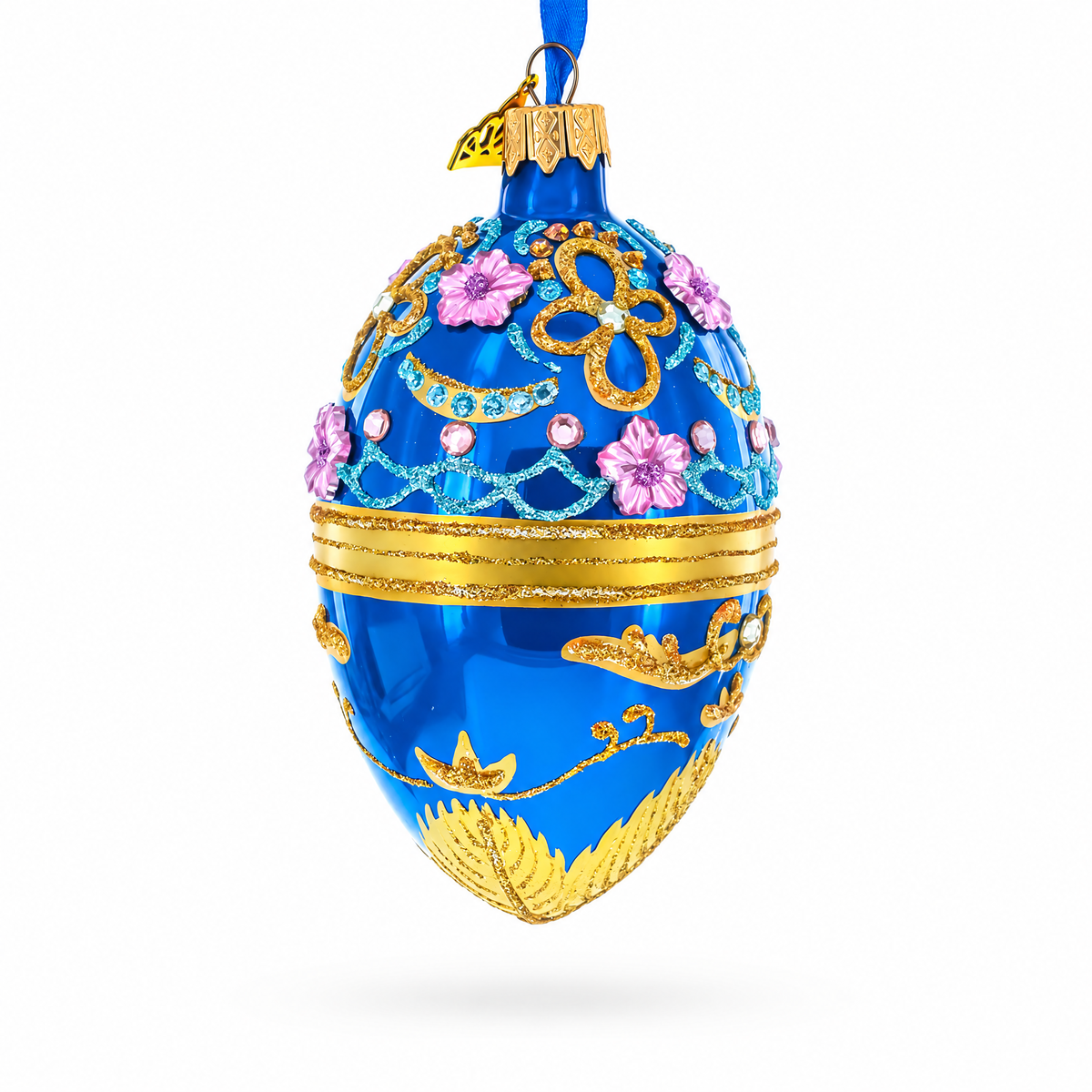 Flowers on Glossy Blue Glass Egg Christmas Ornament 4 Inches